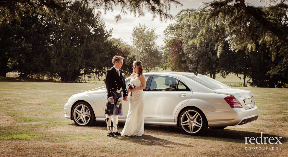 Bride and Groom in Wedding Car